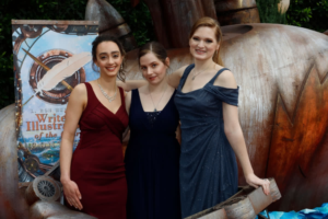 Carrie Callahan, Elise Stephens, and Mica Scotti COle posing at the awards event 2019